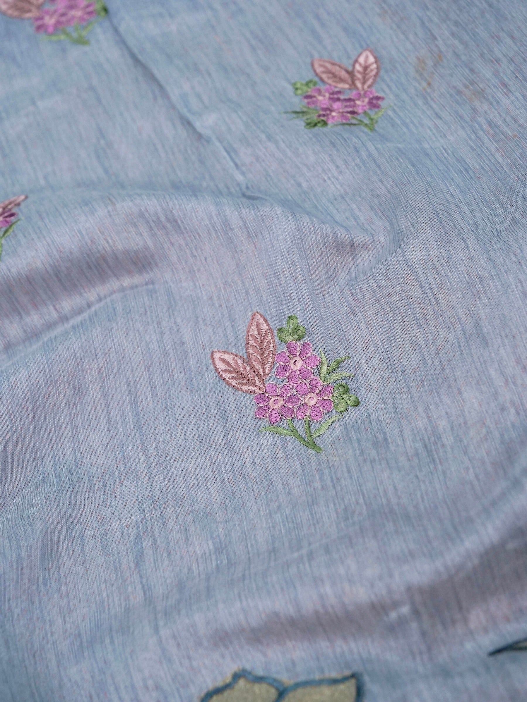 Banarasi cotton silk allover floral computer embroidery with skurt applic border attached jaquard blouse