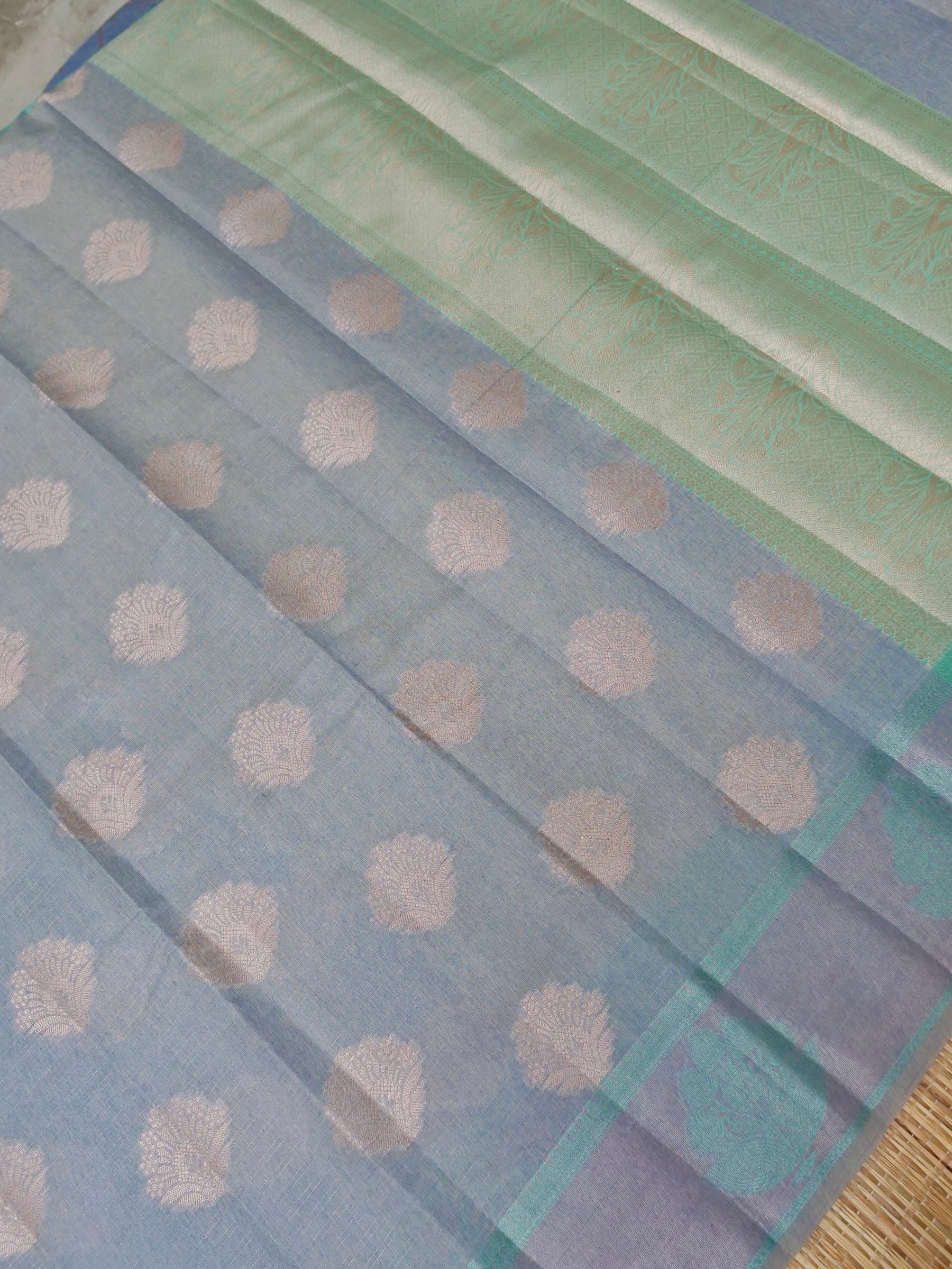 Cotton moti silk zari linning with tissue jari buta border with rich pallu and jacquard Blouse