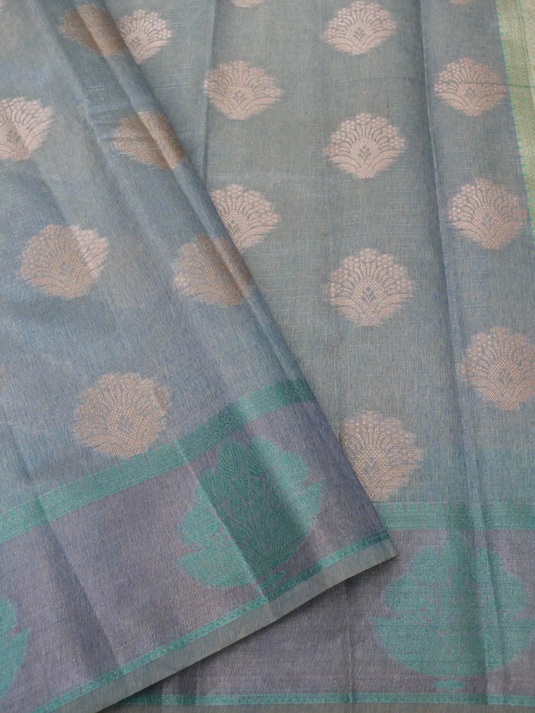 Cotton moti silk zari linning with tissue jari buta border with rich pallu and jacquard Blouse